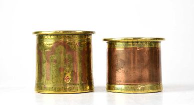 Two graduated Middle Eastern mixed metal cylindrical pots, one with inscription to base, heights 8cm