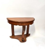 A late 19th century mahogany console table with shaped apron, ball and claw front supports, 77 x