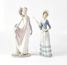 LLADRÓ; a pair of figures of young ladies, height of tallest 34cm (af) (2). Condition Report: -