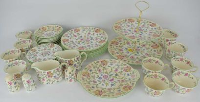 MINTON; a forty-piece 'Haddon Hall' pattern B1451 tea set comprising eight cups, saucers, side