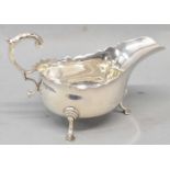 THOMAS BRADBURY & SONS; a George V hallmarked silver sauce boat, Sheffield 1923, 4.05ozt/126g.