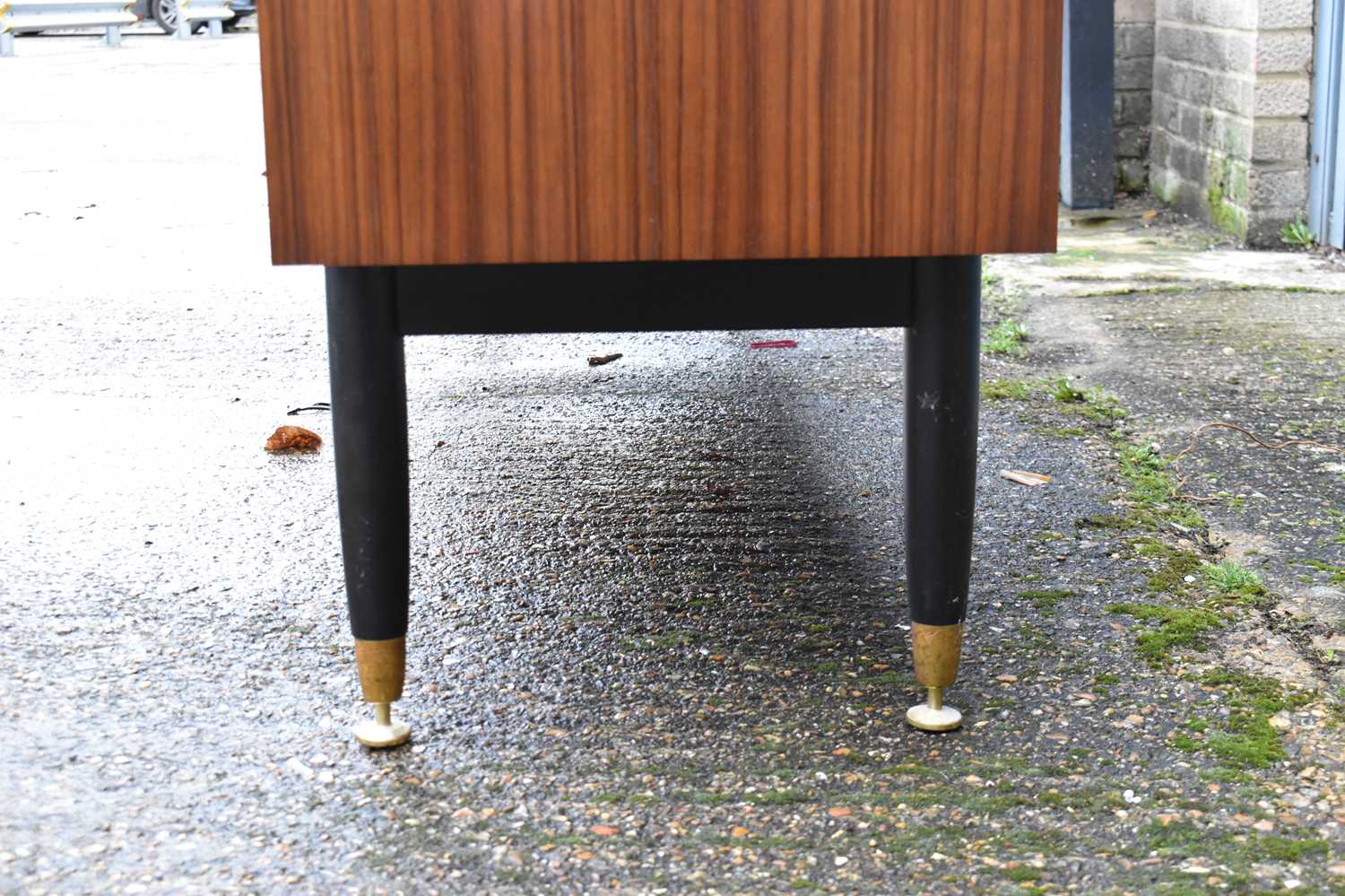 A mid-century sideboard with three central drawers flanked by two cupboard doors, width 191cm. - Image 2 of 3