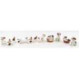 ROYAL DOULTON; eleven assorted figures/figure groups of dogs.