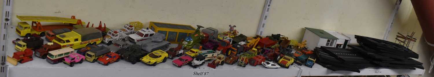 A quantity of Matchbox and Corgi model vehicles and a small quantity of Scalextric track and model