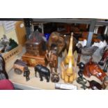 A good collection of large wooden figures of dogs, elephants, horses, monkeys, etc, three dolls