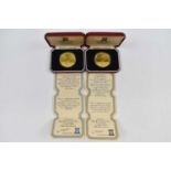 Two cased Pobjoy Mint silver 100 Patacas coins.