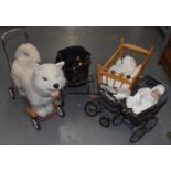A vintage Nylena husky push-along dog toy, three reproduction Victorian style doll's prams, and a