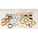 A quantity of assorted decorative bangles.