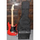 SQUIER BY FENDER; a silver series Stratocaster electric guitar in red, with case, Squier 15