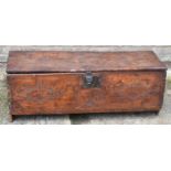 An 18th century oak six plank coffer, the front carved IH, 1744, width 112cm, height 40cm.