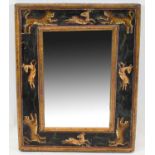 A small Indian rectangular wall mirror, the frame painted with various beasts, 36 x 28.5cm.