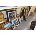A large collection of modern framed pictures and prints.
