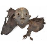 TRIBAL ART; an African mask, probably Dan Tribe, Ivory Coast, height 30cm.