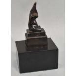 AFTER HENRY MOORE; a bronze of a stylised female torso, bears signature, on substantial base, height