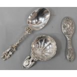 A Dutch silver serving spoon, a pin dish with foreign import marks, and a miniature hand mirror (3)