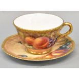ROYAL WORCESTER; a fruit painted cup and saucer, both signed, black printed marks.