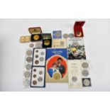 A cased silver crown medal commemorative coin, with various other commemorative coins, cased and