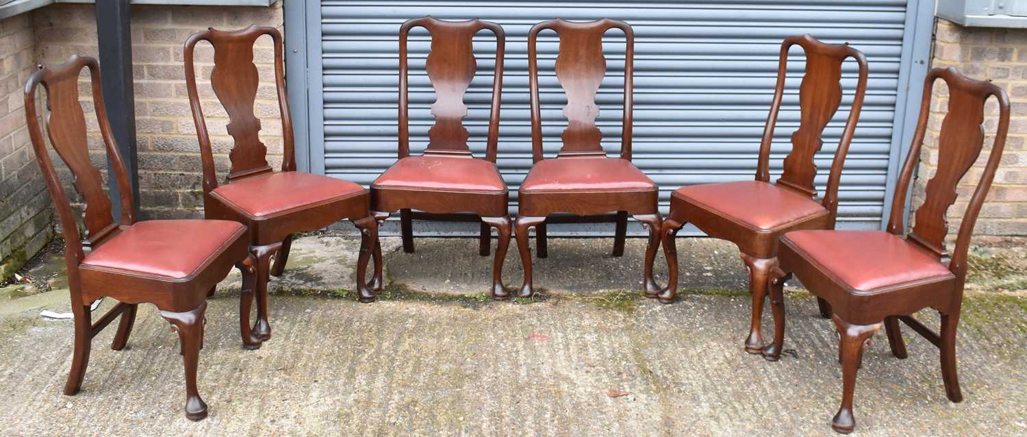 A set of six 19th century Queen Anne style mahogany dining chairs on cabriole supports.