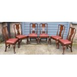 A set of six 19th century Queen Anne style mahogany dining chairs on cabriole supports.