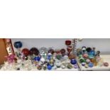 A collection of approx fifty-four glass paperweights including Caithness Ruffles, three large