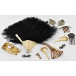 A vintage lot comprising a bone and ostrich feather fan, six lady's faux tortoiseshell hair combs,