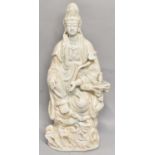 A large Chinese celadon glazed stoneware figure (af) Guan Yin seated holding a sceptre, height