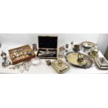 A large quantity of silver plated items comprising twin handled tray, salver, two entree dishes, a