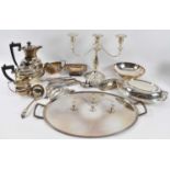 A quantity of assorted plated items including entree dish, four piece tea service, oval tray,