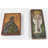 Two Russian icons, painted on soft wood, 18 x 13.5cm and 25 x 9.5cm (2).