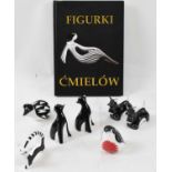 CMIELOW; seven assorted boxed animal figures, together with a book about Cmielow.