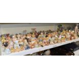 A large collection of resin model teddy bears, many from the Priscilla Hillman collection and