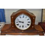 An Edwardian mahogany mantel clock with painted Roman numeral dial, with key and winder, height