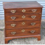 A 19th century mahogany chest with crossbanded top above four long drawers on bracket feet, width