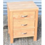 A modern oak three drawer chest, width 48cm.