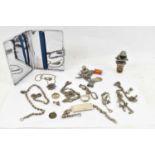 A mixed lot of assorted silver and white metal jewellery including two charm bracelets, identity