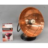 A vintage copper bowl lamp/fire (sold for decorative purposes only).