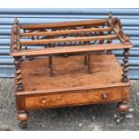 A 19th century burr walnut Canterbury with fretwork decoration and drawer below.Condition Report: