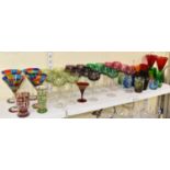 A collection of assorted coloured glassware including Bohemian ruby flash cut vase, height 12cm, a