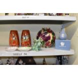 A pair of Grimwades ‘Kookaburra’ orange lustre vases, height 19cm, a Wade Harvest ware vase,