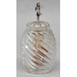 A interesting spiral fluted glass condiment bottle with white metal top moulded as a devil attaching