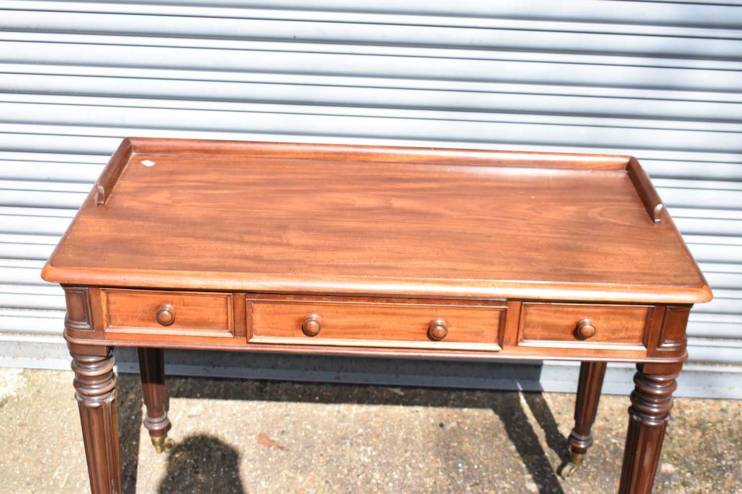 JAMES WINTER, 101 WARDOUR ST, SOLO, LONDON; a 19th century mahogany writing table with three