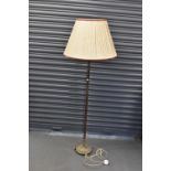 A gilt brass standard lamp, height approx 160cm including shade.