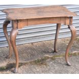 A 19th century Continental oak single drawer side table on cabriole supports, width 93cm at widest