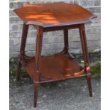 An Edwardian two tier table with shaped top, height 72cm, width 60cm, depth 60cm.