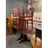A folding dining table and four chairs.