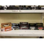 Five boxed collectable model cars comprising of a Corgi Tomorrow Never Dies Aston Martin DB5,