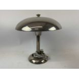 A modern stainless steel metallic mushroom form lamp, height 40cm.