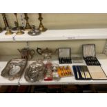 A quantity of silver plate including boxed cutlery and flatware such as pastry forks, butter