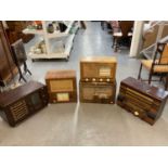 Five vintage wooden and bakelite cased valve radios comprising McMichael, Regentone, Ekco, Beethoven