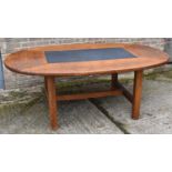 A large elm oval dining table with central black slate/marble insert, on square stretchered